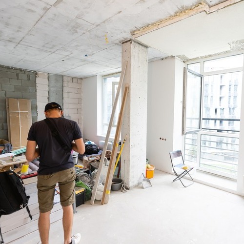 A Remodeler Works on a Kitchen Remodel.