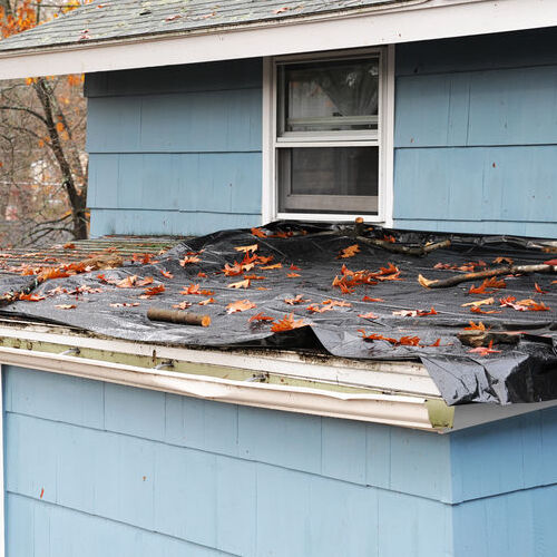 A Roof With a Tarp on It.