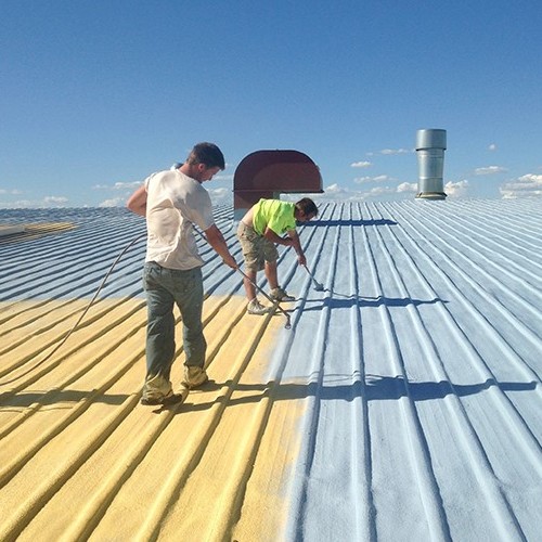 A Contractor Coats a Metal Roof.