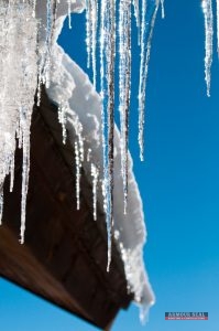 Snow and Icicles on Roof